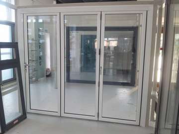 New Hybrid Bi Fold door; fabricated with an alumnium Outer frame , PvcU Door leaves creating the reliablity of Alumnium slim lines at the cost of PVCU 